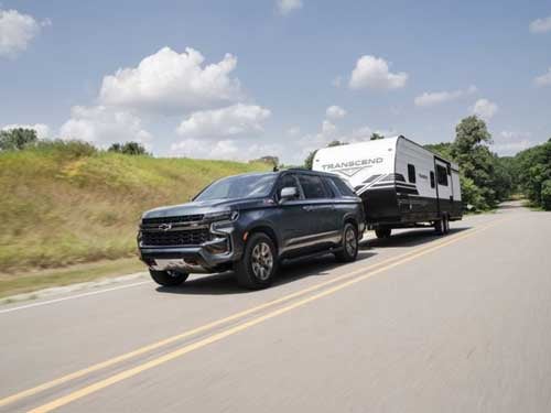 2024 Chevrolet Suburban towing a camper